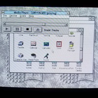 A photo of a monitor displaying Windows 3 playing CANYON.MID