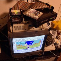 A Sega CD on top of a Sega Tera Drive on top of a PCjr on top of a PVM playing the Sonic CD intro